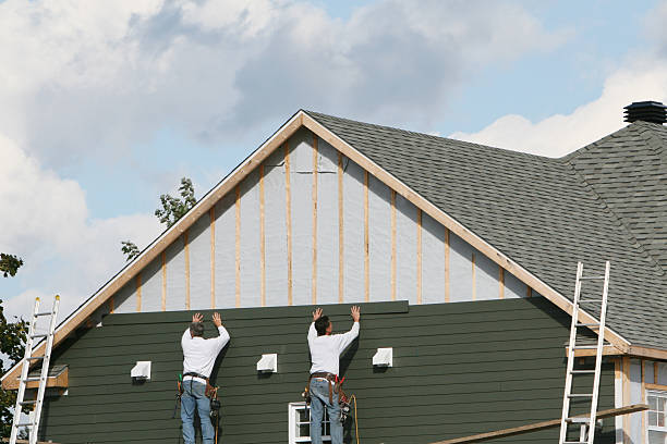 Professional Siding Installation technician working in Bradenton Beach, FL